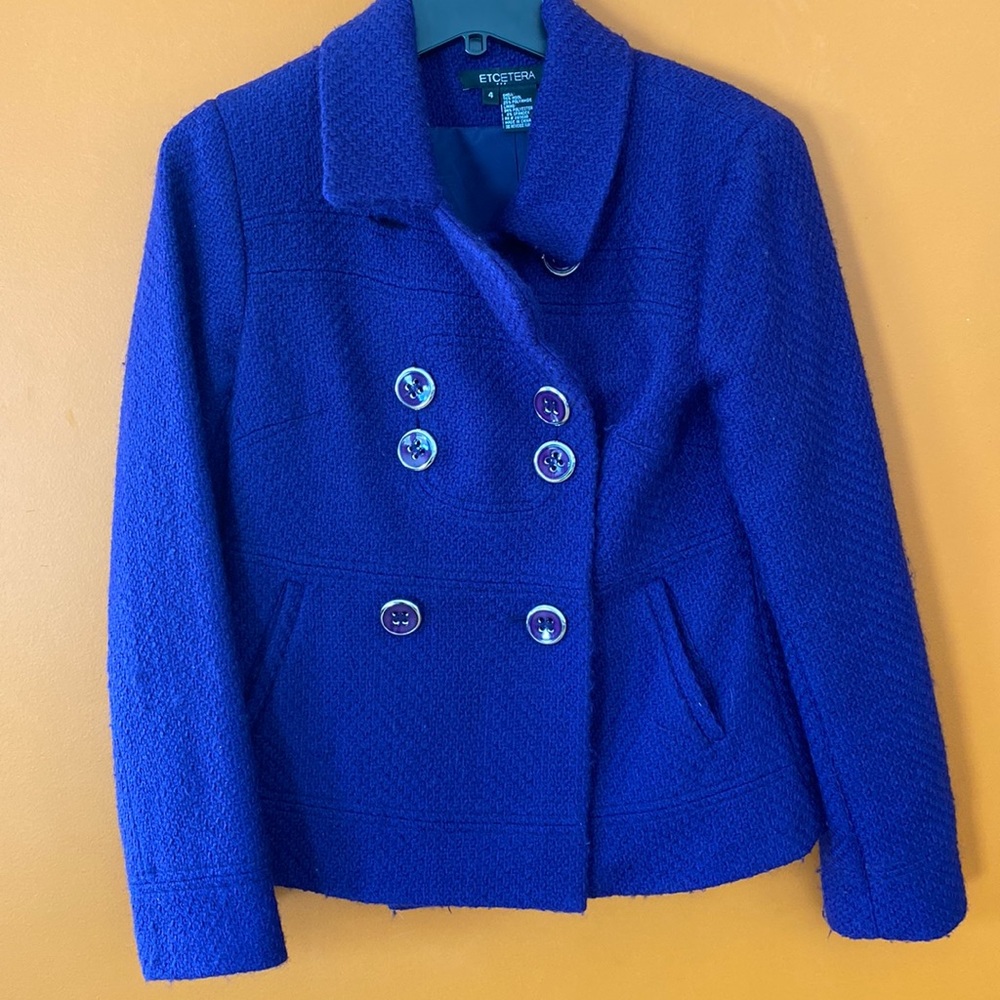 Pea coat made by Etcetera in size 4. 75% wool.